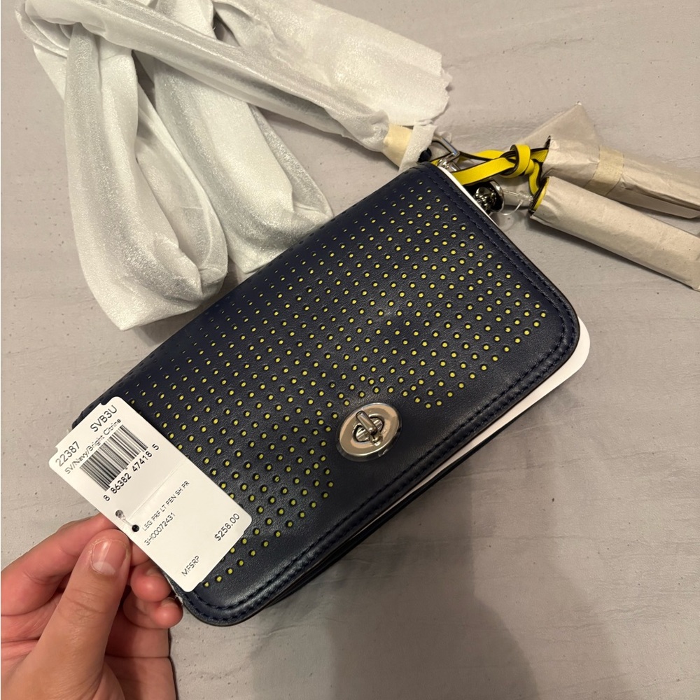 Coach Navy and Yellow Perforated Wallet